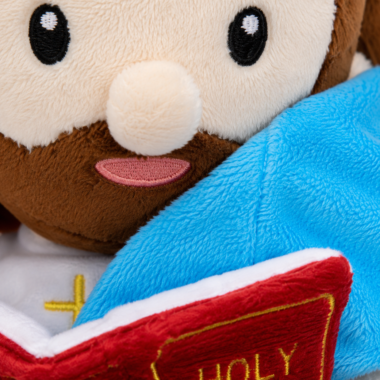 Peluche de Jesús con la Biblia — Muñeco Devocional